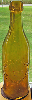 McKECHNIE'S LAGER EMBOSSED BEER BOTTLE