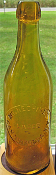 McKECHNIE'S LAGER EMBOSSED BEER BOTTLE