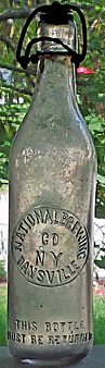 NATIONAL BREWING COMPANY EMBOSSED BEER BOTTLE