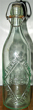 THOMAS FINEGAN BEER EMBOSSED BEER BOTTLE