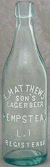 E. MATTHEWS SON'S LAGER BEER EMBOSSED BEER BOTTLE