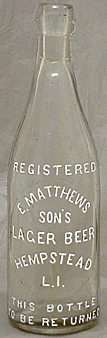 E. MATTHEWS SON'S LAGER BEER EMBOSSED BEER BOTTLE