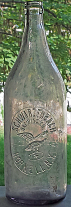 SCHWARZENBACH BREWING COMPANY EMBOSSED BEER BOTTLE