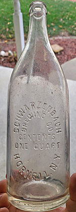 SCHWARZENBACH BREWING COMPANY EMBOSSED BEER BOTTLE