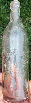 SCHWARZENBACH BREWING COMPANY EMBOSSED BEER BOTTLE