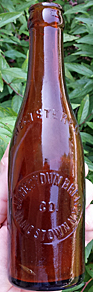 JAMESTOWN BREWING COMPANY EMBOSSED BEER BOTTLE