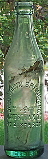 JAMESTOWN BREWING COMPANY EMBOSSED BEER BOTTLE