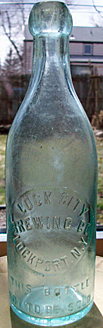 LOCK CITY BREWING COMPANY EMBOSSED BEER BOTTLE