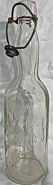 LOCK CITY BREWING COMPANY EMBOSSED BEER BOTTLE