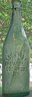 LOCKPORT BREWING COMPANY EMBOSSED BEER BOTTLE