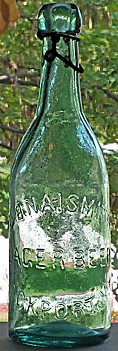 J. B. NAISMITH LAGER BEER EMBOSSED BEER BOTTLE