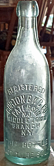 BURTON BREWING COMPANY EMBOSSED BEER BOTTLE