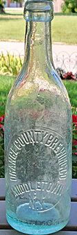 ORANGE COUNTY BREWING COMPANY EMBOSSED BEER BOTTLE