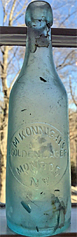 M. KONNIGHT'S GOLDEN LAGER EMBOSSED BEER BOTTLE