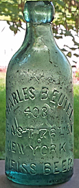 CHARLES BEUTEL WEISS BEER EMBOSSED BEER BOTTLE