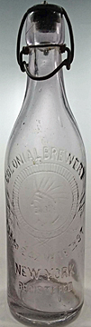 COLONIAL BREWERY EMBOSSED BEER BOTTLE