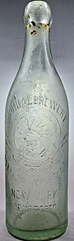 COLONIAL BREWERY EMBOSSED BEER BOTTLE