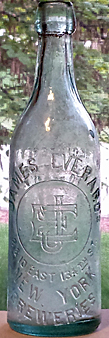 JAMES EVERARD'S BREWERIES EMBOSSED BEER BOTTLE