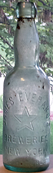 JAMES EVERARD'S BREWERIES EMBOSSED BEER BOTTLE