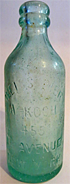 A. KOCH WEISS BIER EMBOSSED BEER BOTTLE