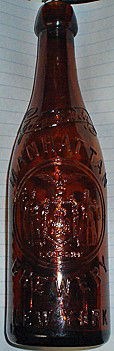 JOHN F BETZ MANHATTAN BREWERY EMBOSSED BEER BOTTLE