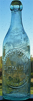 NATHAN PUTTER'S EXTRA BEER EMBOSSED BEER BOTTLE