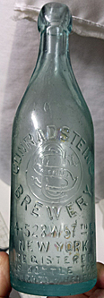 CONRAD STEIN'S BREWERY EMBOSSED BEER BOTTLE