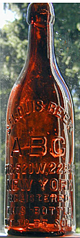 THE AMERICAN BREWING COMPANY EMBOSSED BEER BOTTLE