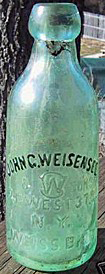 JOHN G. WEISENSEE & SONS WEISS BIER EMBOSSED BEER BOTTLE