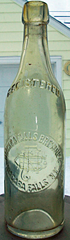 NIAGARA FALLS BREWING COMPANY EMBOSSED BEER BOTTLE