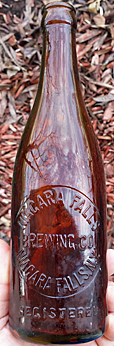 NIAGARA FALLS BREWING COMPANY EMBOSSED BEER BOTTLE