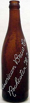 AMERICAN BREWING COMPANY EMBOSSED BEER BOTTLE