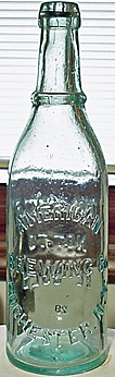 AMERICAN BREWING COMPANY EMBOSSED BEER BOTTLE