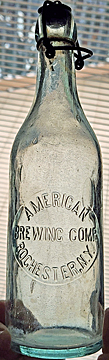 AMERICAN BREWING COMPANY EMBOSSED BEER BOTTLE