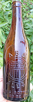 AMERICAN BREWING COMPANY EMBOSSED BEER BOTTLE