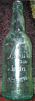 MONROE KING OF ROCHESTER BEER EMBOSSED BEER BOTTLE