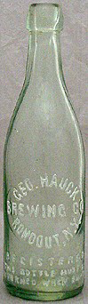 GEORGE HAUCK BREWING COMPANY EMBOSSED BEER BOTTLE