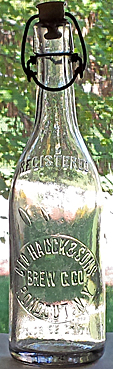 GEORGE HAUCK BREWING COMPANY EMBOSSED BEER BOTTLE