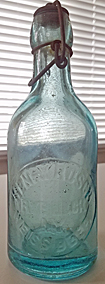 HENRY RUSCH WEISS BEER EMBOSSED BEER BOTTLE