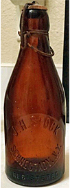 J. H. STOCK WEBER'S WEISS BEER EMBOSSED BEER BOTTLE