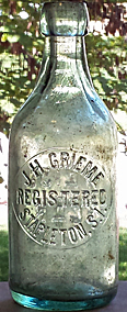 J. H. GRIEME WEISS BEER EMBOSSED BEER BOTTLE