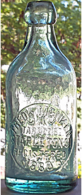 FREDERICK MENKEN WEISS BIER EMBOSSED BEER BOTTLE