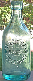 CHARLES SCHNEIDER WEISS BEER EMBOSSED BEER BOTTLE