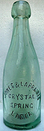 CRYSTAL SPRING LAGER EMBOSSED BEER BOTTLE