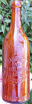 HABERLE AND CRYSTAL SPRING LAGER EMBOSSED BEER BOTTLE