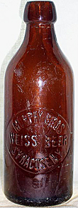 MURPHY BROTHERS WEISS BEER EMBOSSED BEER BOTTLE