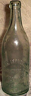 THE ISENGART BREWING COMPANY EMBOSSED BEER BOTTLE