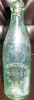 THE ISENGART BREWING COMPANY EMBOSSED BEER BOTTLE