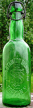 JOHN STANTON BREWING COMPANY EMBOSSED BEER BOTTLE