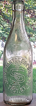 JOHN STANTON BREWING COMPANY EMBOSSED BEER BOTTLE